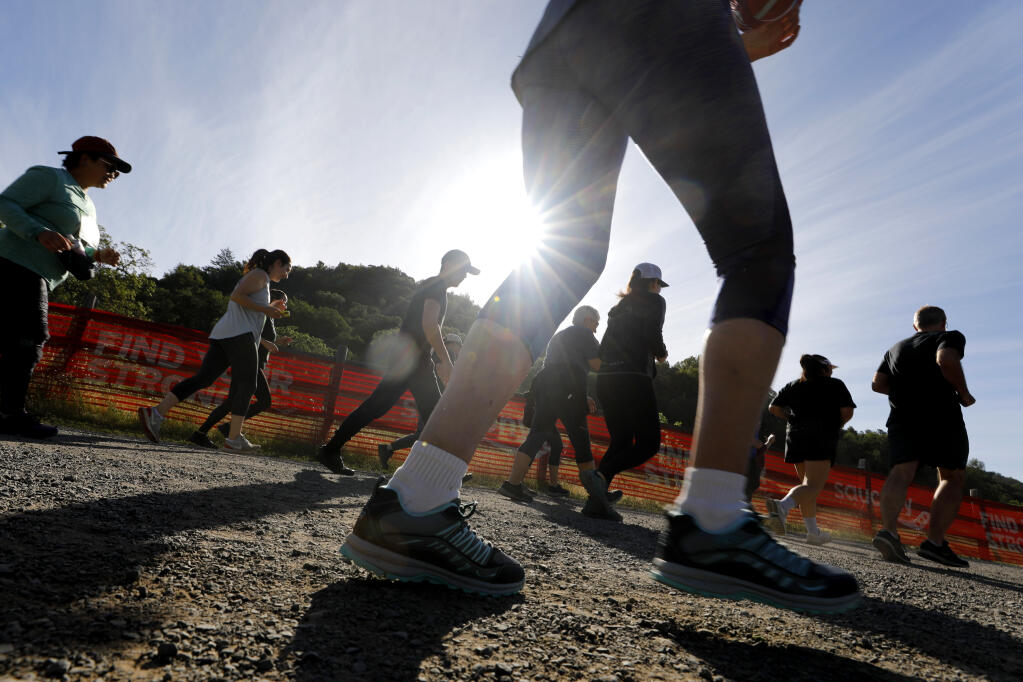 Runners in the Annadel 5K take off from the starting line in Spring Lake Regional Park in Santa Rosa, Calif., on Sunday, April 10, 2022.(Beth Schlanker/The Press Democrat)