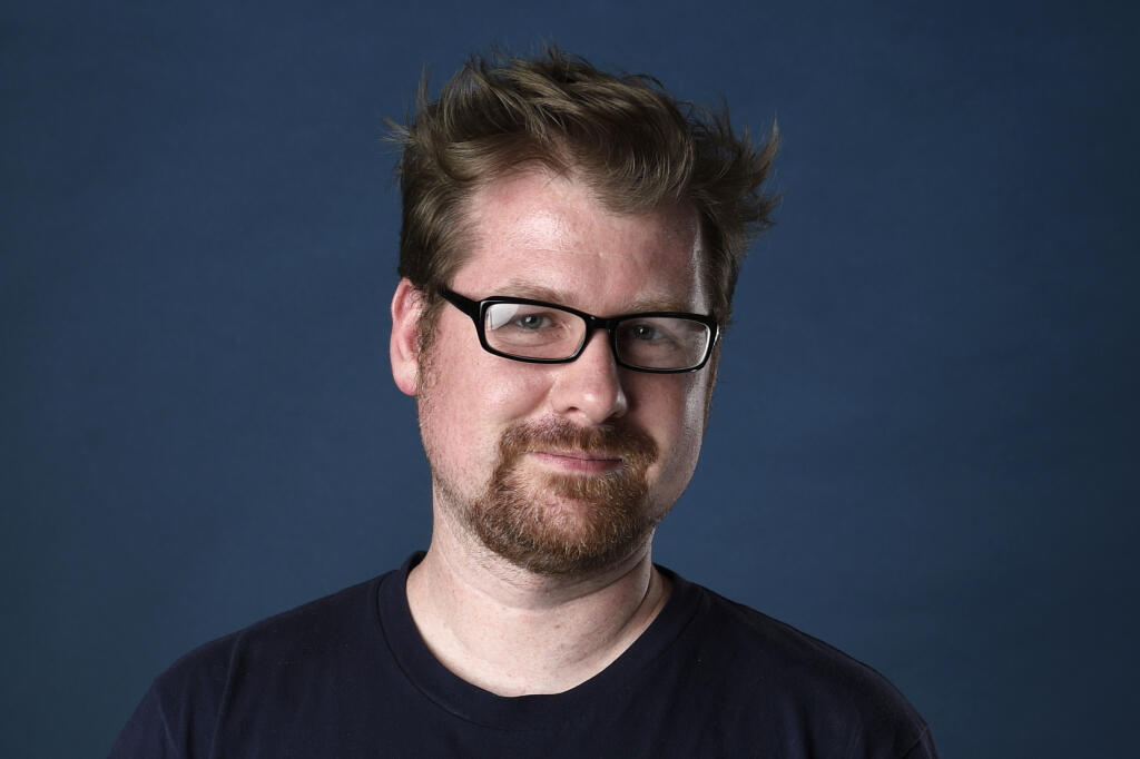 FILE - Justin Roiland poses for a portrait to promote the television series "Rick and Morty" on day two of Comic-Con International, July 21, 2017, in San Diego. (Photo by Chris Pizzello/Invision/AP, File)