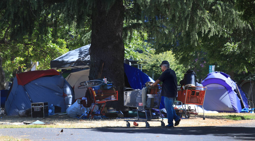 An encampment of homeless people is seen at Fremont Park in Santa Rosa on Friday, July 24, 2020.  (Kent Porter / The Press Democrat) 2020