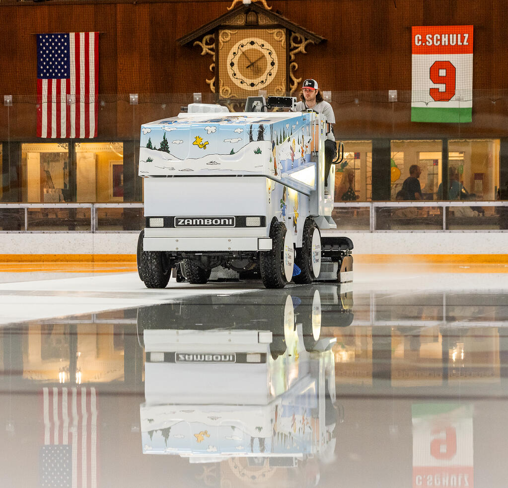 Andrew Olson drives the new electric-powered Zamboni to clean the ice between games at the Snoopy’s 45th Annual Senior World Hockey Tournament at Snoopy’s Home Ice in Santa Rosa, Tuesday, July 11, 2023. (John Burgess / The Press Democrat)