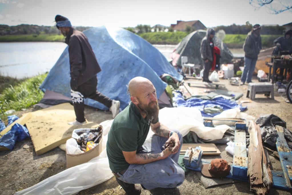 Daniel Vanderford, pictured here Feb. 16, 2022, lives at the homeless encampment at Steamer Landing along the Petaluma River. The encampment is at the center of months of legal wrangling between campers and the city of Petaluma. (CRISSY PASCUAL/ARGUS-COURIER STAFF)