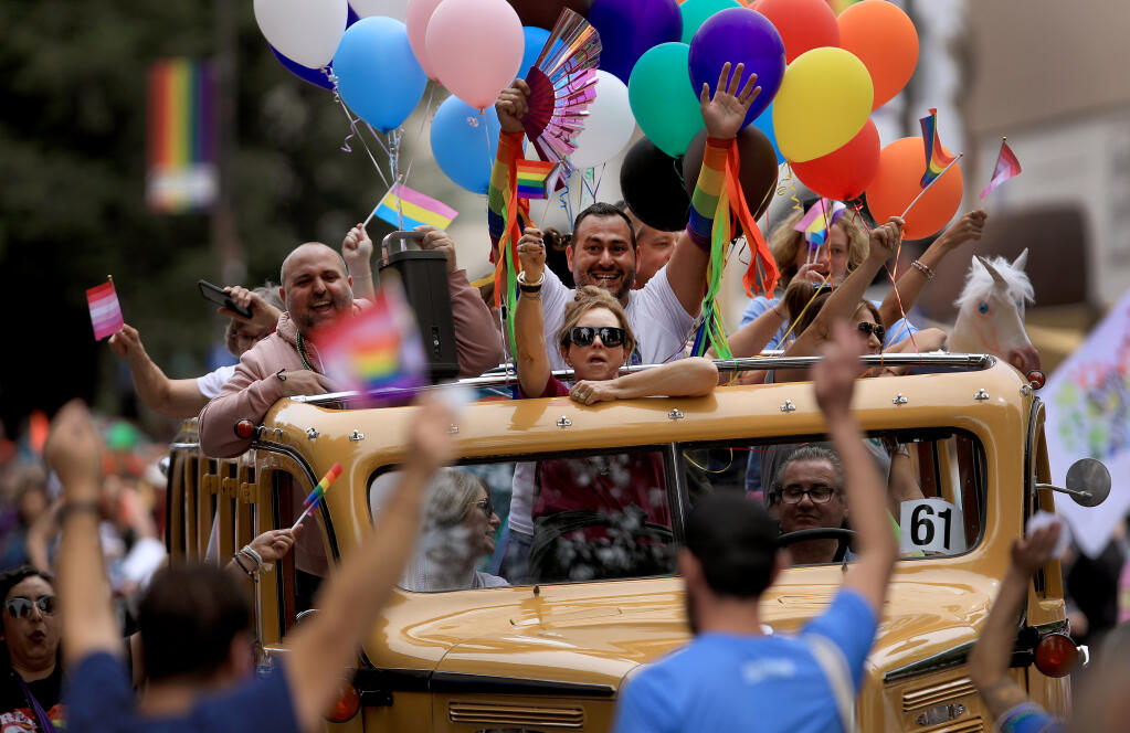 The Windsor Pride Festival float makes an appearance at the Sonoma County Pride Parade and Festival in downtown Santa Rosa, Saturday, June 4, 2022. (Kent Porter / The Press Democrat) 2022