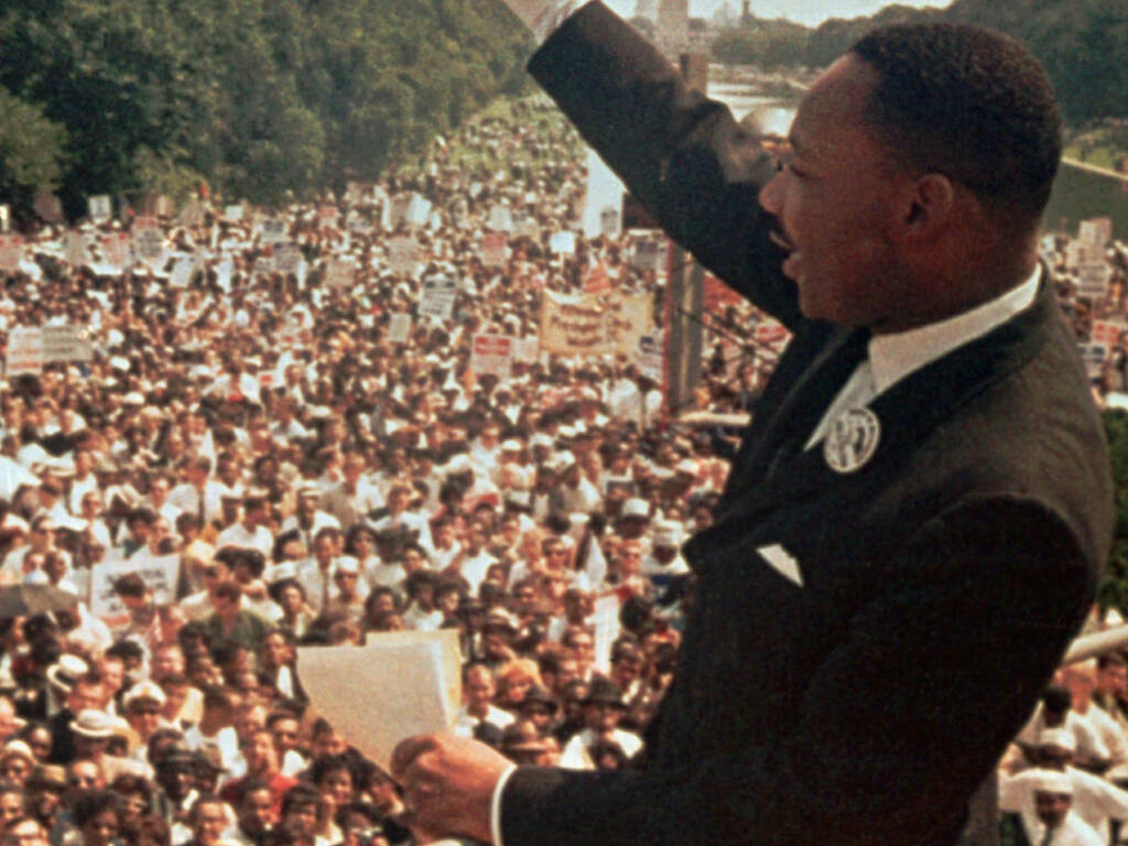 Martin Luther King Jr. acknowledges the crowd at the Lincoln Memorial for his “I Have a Dream” in 1963. (Associated Press)