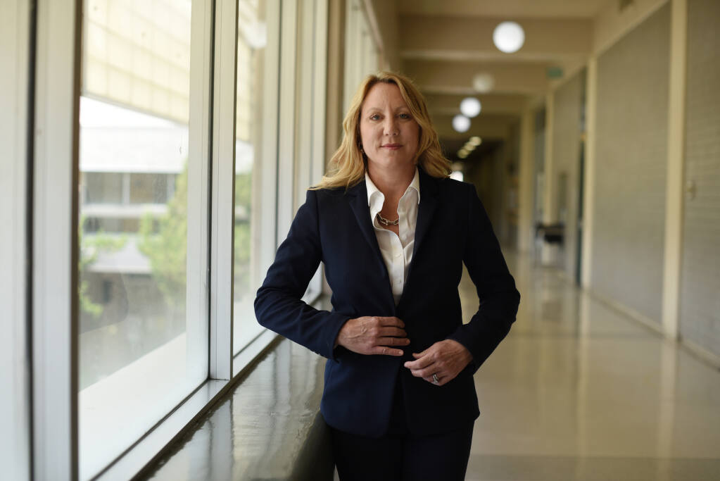 Sonoma County District Attorney-elect Carla Rodriguez stands in the hallway of the Sonoma County Superior Court in Santa Rosa on Wednesday June 8, 2022. Rodriguez, who ran unopposed during Tuesday’s primary election, will take office in January. (Erik Castro / For The Press Democrat)
