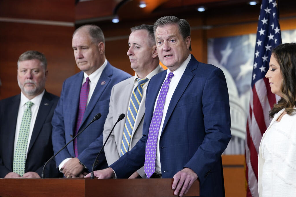 House Intelligence Committee ranking member Rep Mike Turner, R-Ohio, second from right, speaks during a news conference on Capitol Hill in Washington, Friday, Aug. 12, 2022, on the FBI serving a search warrant at former President Donald Trump's home in Florida.Turner is joined by, from left, Rep. Rick Crawford, R-Ark., Rep. Trent Kelly, R-Miss., Rep. Brian Fitzpatrick, R-Pa., and Rep. Elise Stefanik, R-N.Y. (AP Photo/Susan Walsh)