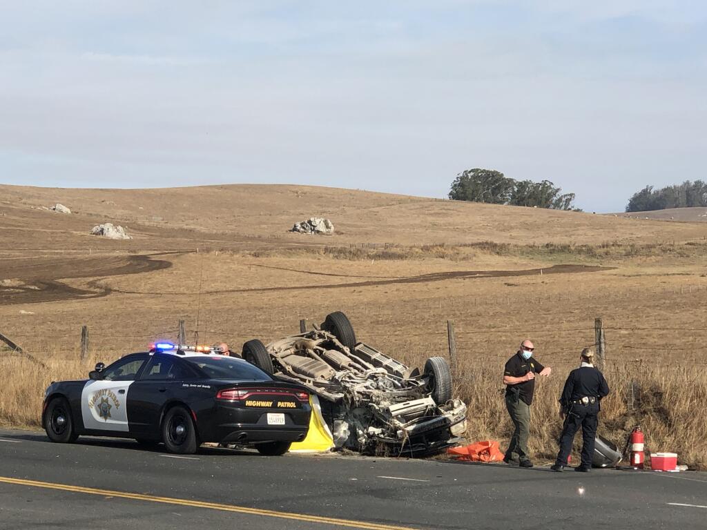 California Highway Patrol officers investigate the scene of a fatal crash near Two Rock, Tuesday, Aug. 18, 2020. (Beth Schlanker / The Press Democrat)