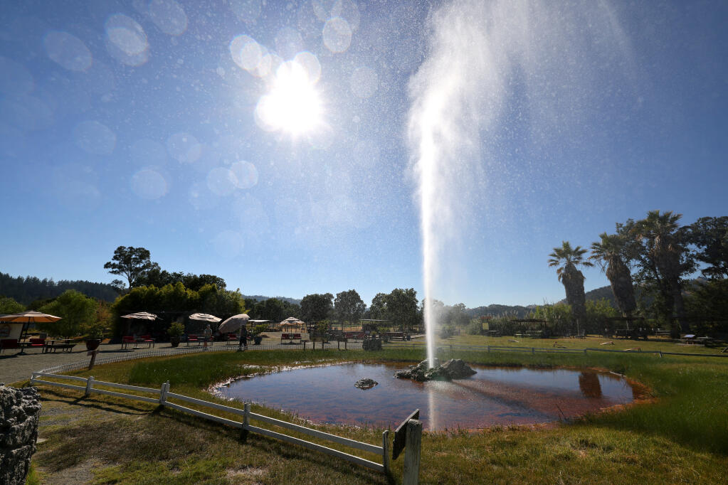 A spout of water shoots into the air at the Old Faithful Geyser of California in Calistoga, Monday, July 31, 2023. (Beth Schlanker / The Press Democrat)