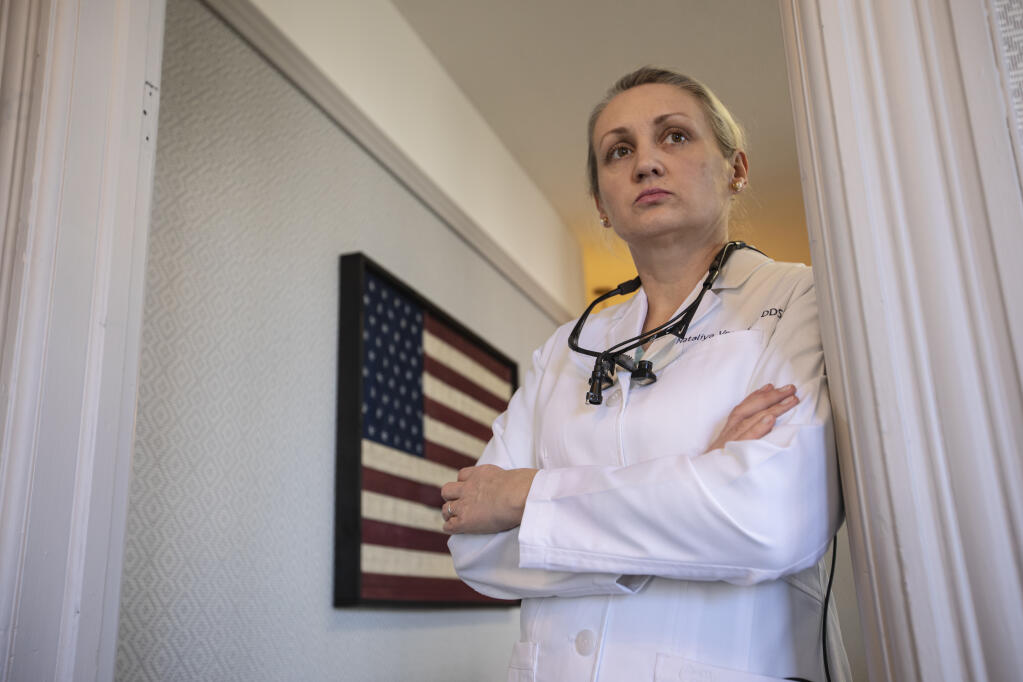 Sebastopol dentist Nataliya Vorobets, who is from Ukraine, worries about her parents who still live in the western part of the county as they have been informed of evacuation plans and bomb shelter locations in the recent days. (Chad Surmick / Press Democrat)