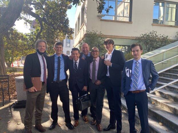 Defendants in an armed robbery case pictured March 5, 2021 with their attorneys outside Mendocino County Superior Court after prosecutors dismissed all charges following two mistrials. From right to left, attorney Lewis Finch, Nathan Kurtz, attorney Erick Guzman, attorney Patrick Ciocca, attorney Jai Gohel, Christian Shane Waier and Azuriah Paul.