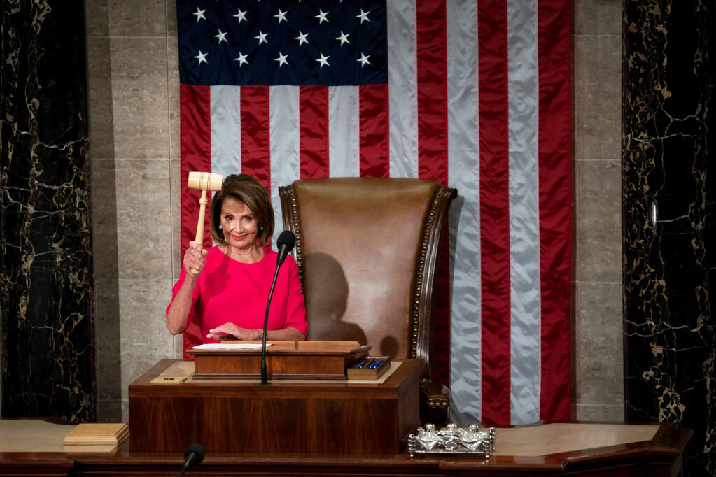 Nancy Pelosi wields the gavel after her election to a second stint as speaker after Democrats regained control of House in 2019. (ERIN SCHAFF / New York Times)
