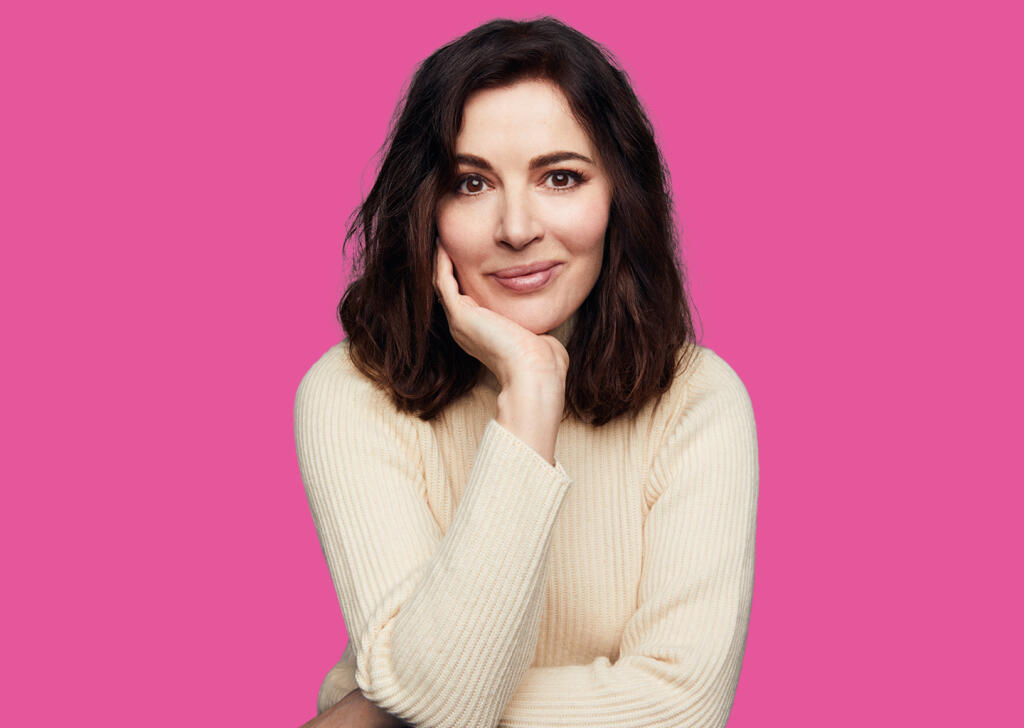“People always ask me — nearly all women — what is your guilty pleasure? And I just feel, why are you making me feel guilty? If I want a fried chicken sandwich, I want to feel inordinately blessed that I can eat that, and it’s wonderful, and I love it,” says food journalist and international TV cooking show host Nigella Lawson, who comes to the Luther Burbank Center for the Arts Nov. 16. (Matt Holyoak)