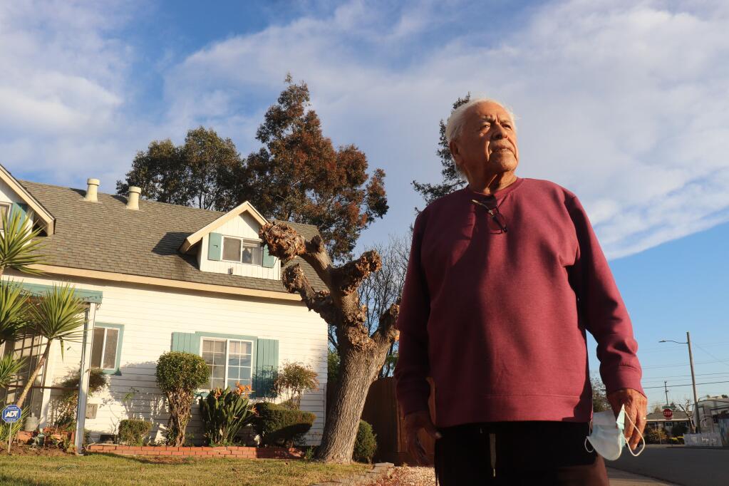 Edward Donate in front of his home in East Petaluma, where he and his wife Gloria raised four children. Edward and Gloria have lived in the same house for 58 years. (PHOTO BY LINA HOSHINO)