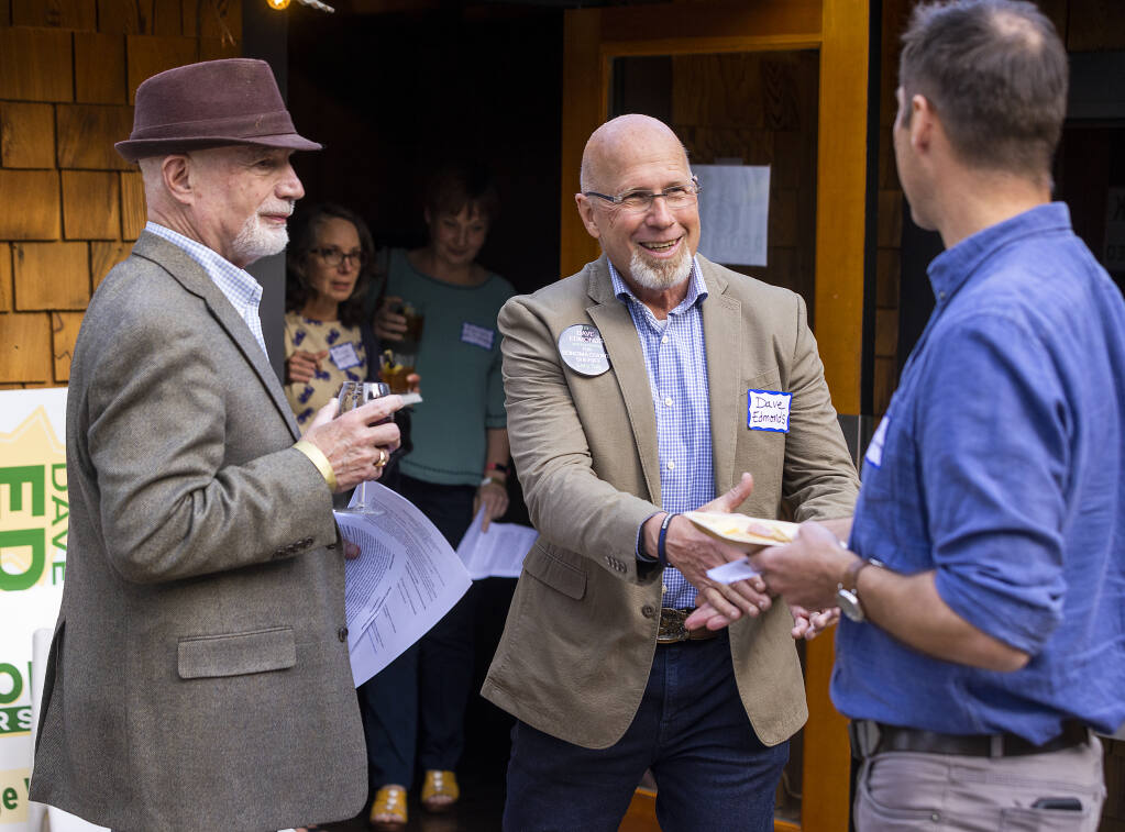 Sonoma County Sheriff Candidate Dave Edmonds shakes hands with constituents at a meet-and-greet at the Dawn Ranch in Guerneville on Thursday, March 24 2022. (John Burgess/The Press Democrat)