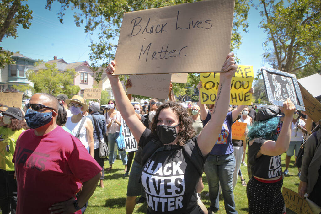 A protest and march in support of two recently fired Black staff members of St. Vincent de Paul High School took place on Sunday, Aug. 2, 2020 in Petaluma, California. Marchers walked from the high school to St. Vincent de Paul Roman Catholic Church. (Crissy Pascual/The Argus-Courier)
