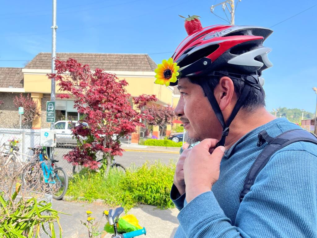 A cyclist sports a jaunty helmet for a fundraising bike ride from Santa Rosa to Sebastopol, April 2, 2022. Money raised went to the Neighborhood Garden Initiative to combat food insecurity. (Photo Courtesy: Lisa Waltenspiel)
