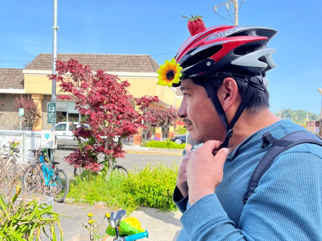 A cyclist sports a jaunty helmet for a fundraising bike ride from Santa Rosa to Sebastopol, April 2, 2022. Money raised went to the Neighborhood Garden Initiative to combat food insecurity. (Photo Courtesy: Lisa Waltenspiel)