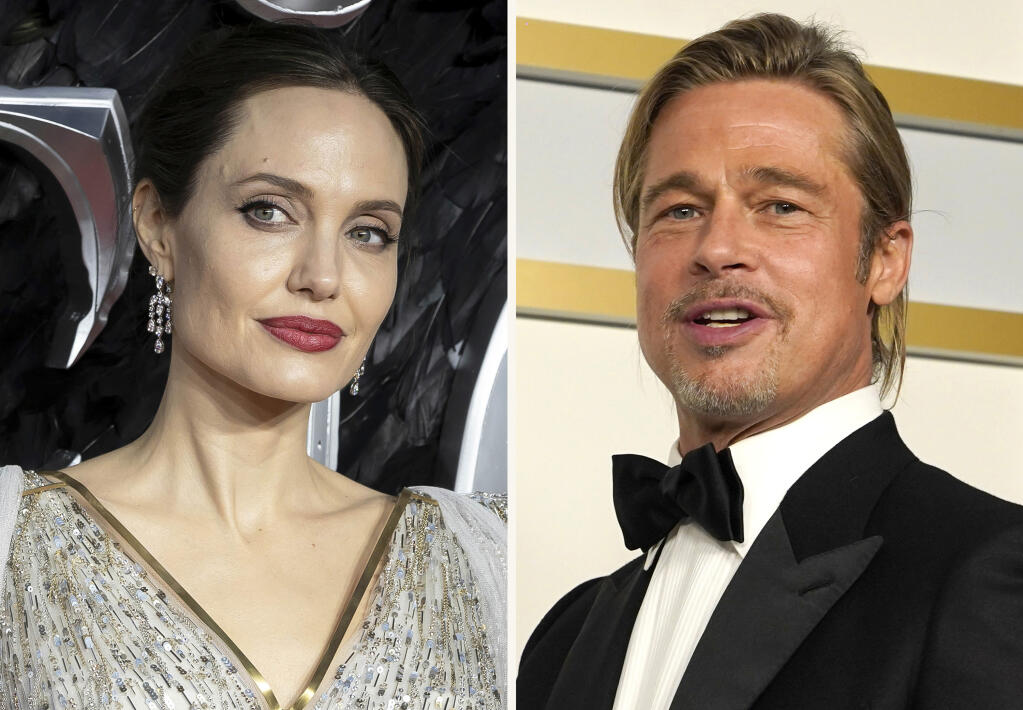In this combination photo, Angelina Jolie, left, arrives at the European Premiere of "Maleficent Mistress of Evil" in central London on Oct. 9, 2019, and Brad Pitt poses in the press room at the Oscars on April 25, 2021, in Los Angeles. A California appeals court on Friday, July 23, 2021, disqualified a private judge being used by Angelina Jolie and Brad Pitt in their divorce case, handing Jolie a major victory. The 2nd District Court of Appeal agreed with Jolie that Judge John Ouderkirk didn't sufficiently disclose business relationships with Pitt's attorneys. The decision means that the custody fight over the couple's five minor children, which was nearing an end, could be starting over. (AP Photo)