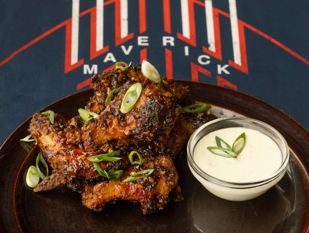 Noah Hoffman created a sauce with Frank’s RedHot and Mae Ploy Chili Sauce for his “Maverick” hot wings for the Rialto Cinemas annual Oscar Night Party menu in Sebastopol. (John Burgess/The Press Democrat)