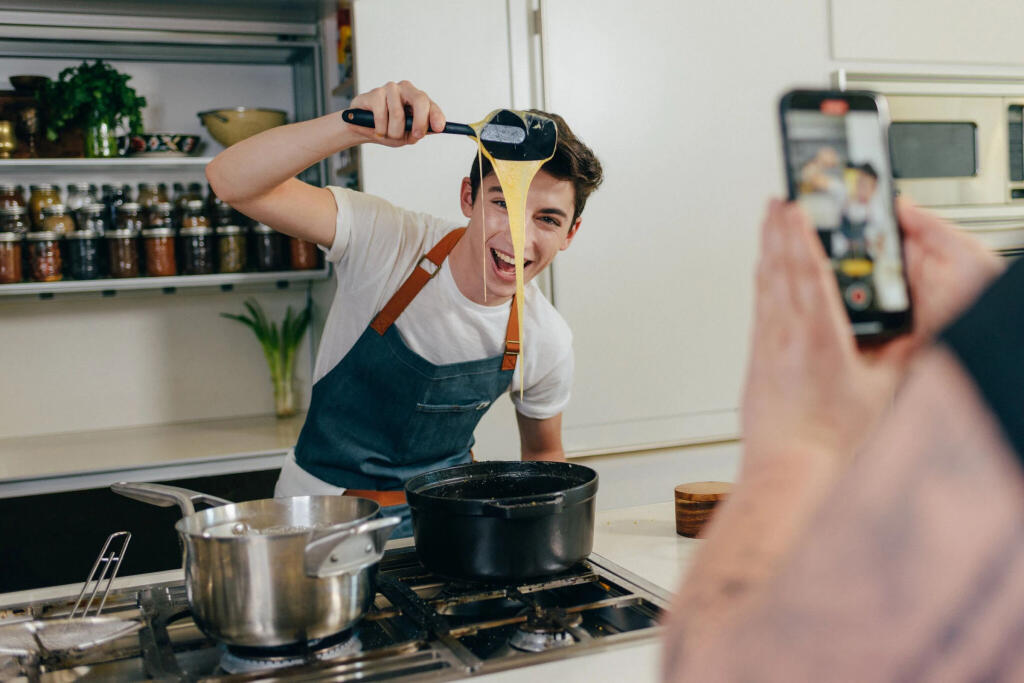 Eitan Bernath, a 19-year-old TikTok star with more than 1.6 million followers, films a cooking video at his home in New York, May 17, 2021. “TikTok is the biggest thing that happened to me in my career, and honestly the reason why I am where I am today,” said Bernath. (New York Times photo)