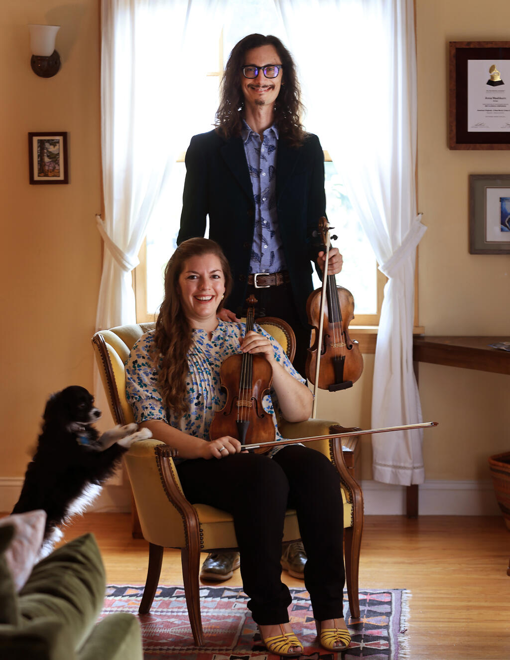 Musicians Aaron Westman and Anna Washburn (and dog Iggy) at their home in Santa Rosa, Friday, Sept. 29, 2023. (Kent Porter / The Press Democrat)