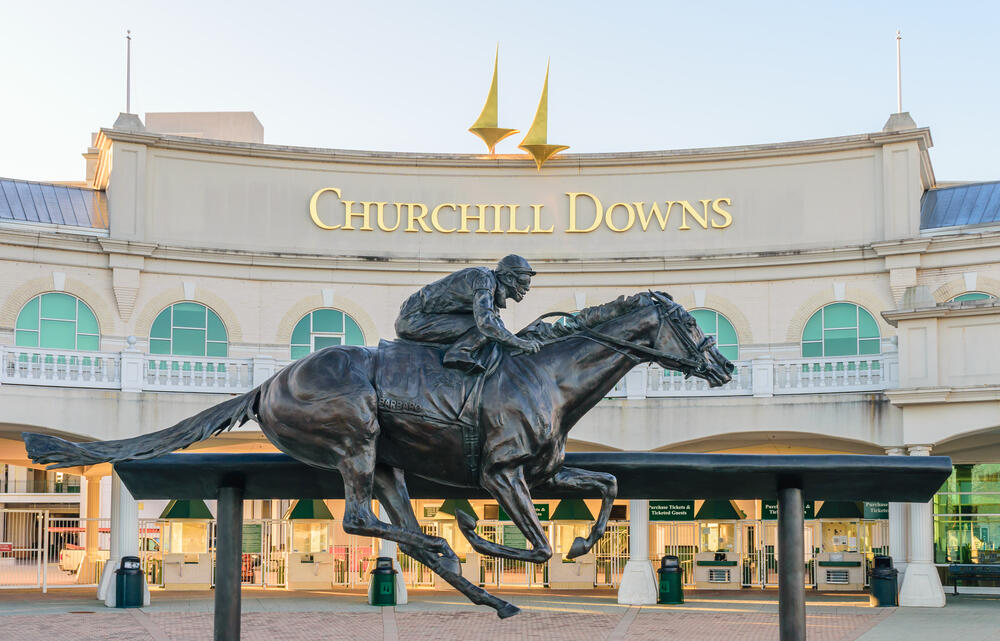 Entrance to Churchill Downs in Louisville, Kentucky, featuring a statue of 2006 Kentucky Derby Champion Barbaro. (Thomas Kelley / Shutterstock, 2016)