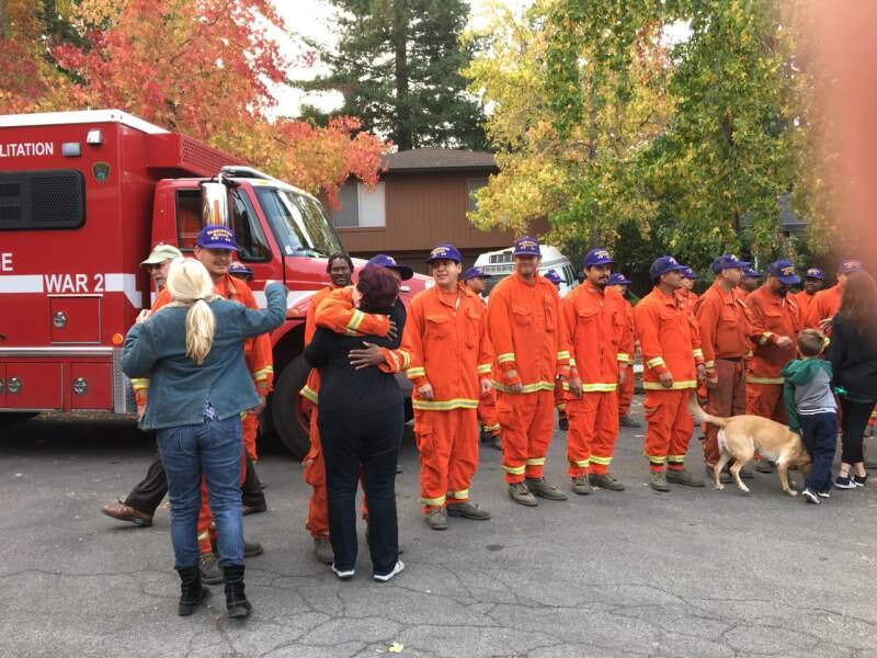 Santa Rosa residents thank the prisoner-firefighters who saved their homes during the 2017 North Bay wildfires. (Chris Smith/Press Democrat)