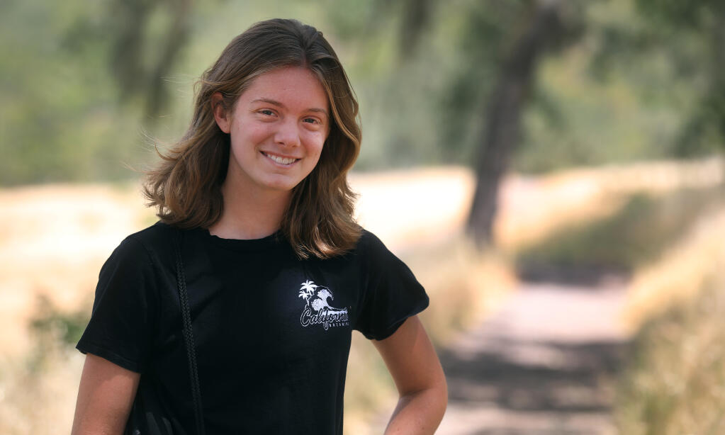 Santa Rosa High School senior and cross country runner Emilie Cates has created a book logging every legal and illegal trail in Trione-Annadel State Park. (Kent Porter / The Press Democrat)