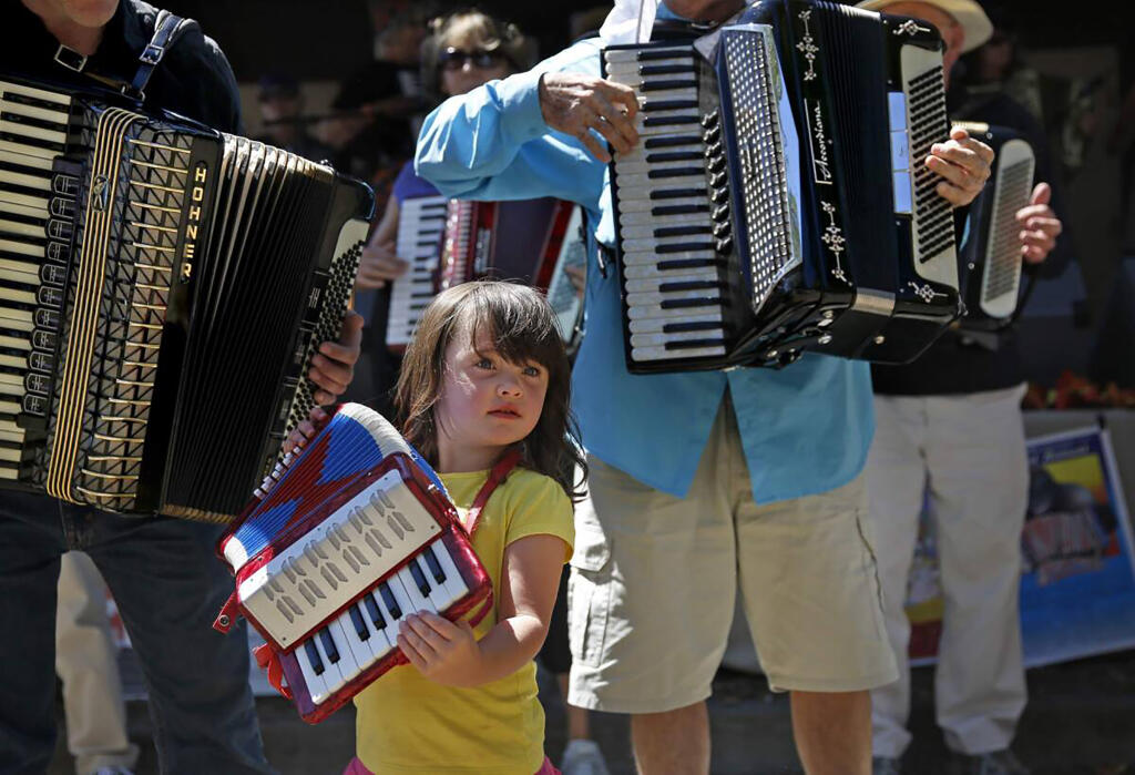 The two-day Cotati Accordion Festival, a multicultural, multigenerational accordion extravaganza held in La Plaza Park in downtown Cotati, returns this year on Saturday and Sunday, Aug. 20 and 21. (Beth Schlanker/The Press Democrat)