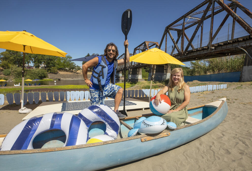 Kim and David Lockhart relocated from Santa Monica to Sonoma County and bought River's Edge Kayak and Canoe business along the Russian River in Healdsburg.  (John Burgess / The Press Democrat)