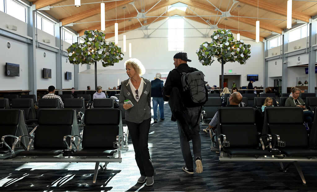 Departing passengers use the new terminal at the Charles M. Schulz Sonoma County Airport, Wednesday, Nov. 16, 2022 in Santa Rosa. . (Kent Porter / The Press Democrat) 2022