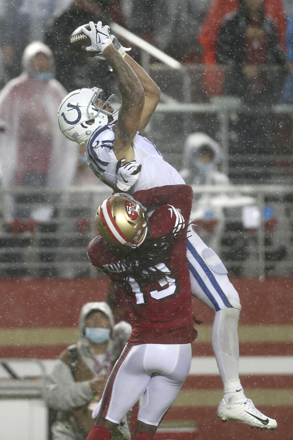 Indianapolis Colts wide receiver Michael Pittman Jr., top, catches a touchdown pass over San Francisco 49ers cornerback Dre Kirkpatrick (13) during the second half of an NFL football game in Santa Clara, Calif., Sunday, Oct. 24, 2021. (AP Photo/Jed Jacobsohn)