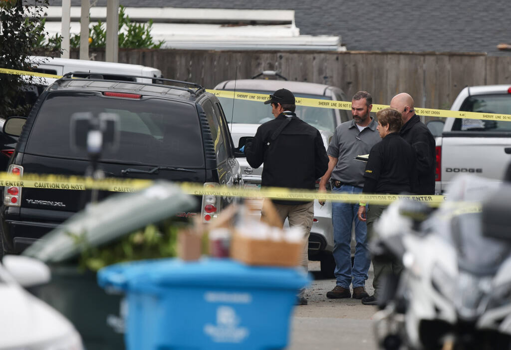 Sonoma County Sheriff's Office personnel investigate a scene on Peach Court in Santa Rosa after a man died in the custody of Santa Rosa police on Thursday, November 18, 2021.  (Christopher Chung/ The Press Democrat)