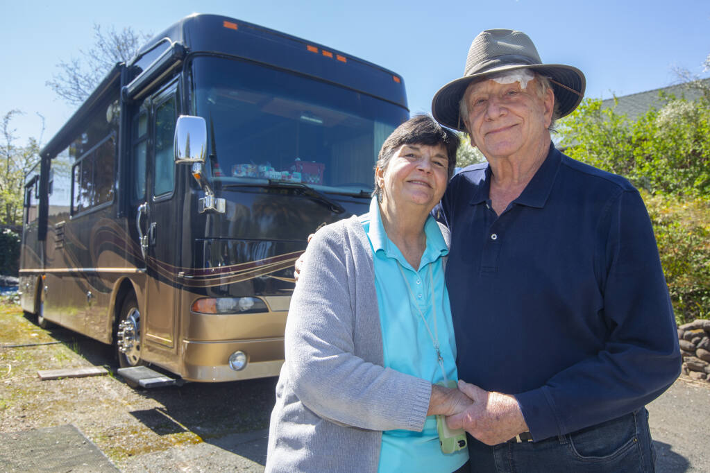 Mary and George Wilcox in front of their 34-foot Alpine Coach motorhome  parked at their home in Sonoma on Monday, March 22, 2021. (Photo by Robbi Pengelly/Index-Tribune)