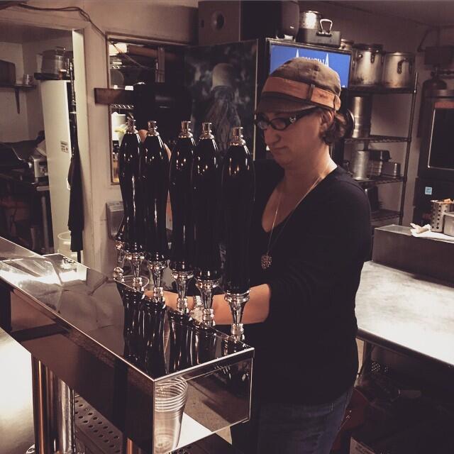 Mona Stallard steps in as bartender during a freelance gig. (Photo courtesy Will Stallard)