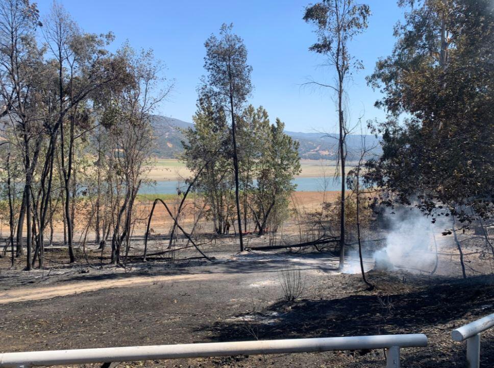 The Hopkins fire  burned to the western shore of Lake Mendocino. Photo taken Monday, Sept. 13, 2021. (Colin Atagi / The Press Democrat)