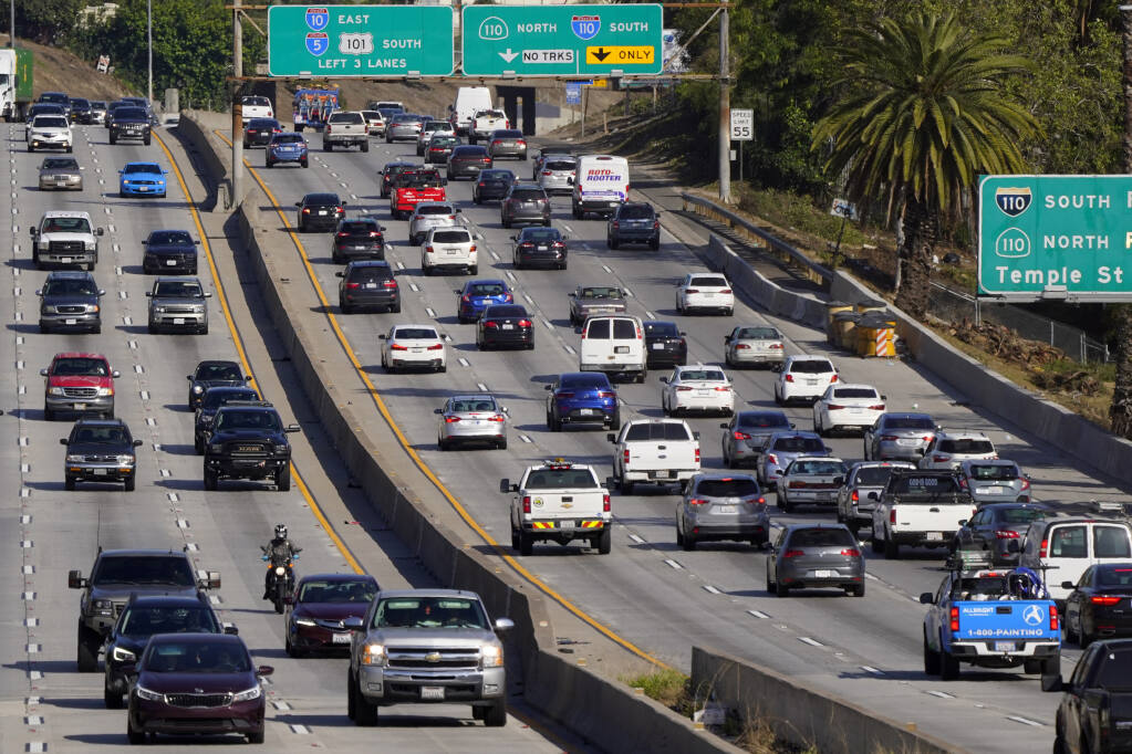 FILE - This April 16, 2020 file photo shows traffic on the Hollywood Freeway (U.S. 101) in Los Angeles. (AP Photo/Mark J. Terrill, File)