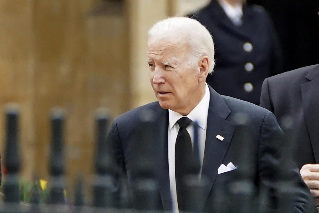 US President Joe Biden arrives at Westminster Abbey on the day of Queen Elizabeth II funeral in central London, Monday, Sept. 19, 2022. The Queen, who died aged 96 on Sept. 8, will be buried at Windsor alongside her late husband, Prince Philip, who died last year. ( James Manning/Pool Photo via AP)