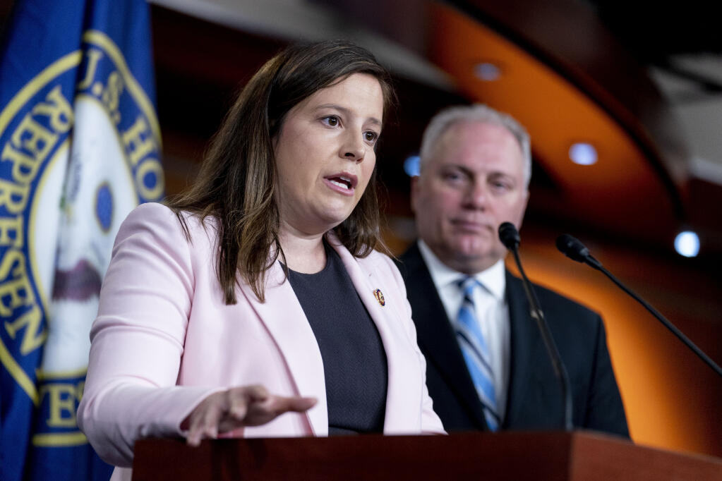 House Republican Conference Chair Rep. Elise Stefanik, R-N.Y., accompanied by House Minority Whip Steve Scalise, R-La., right, speaks at a news conference on Capitol Hill in Washington, Tuesday, June 15, 2021. (AP Photo/Andrew Harnik)
