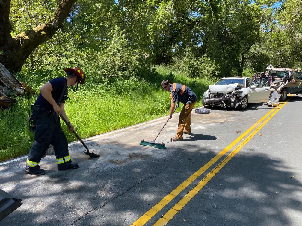 Three people, including a 17-year-old and a Sonoma County Sheriff's Office community service officer, were hospitalized after a three-vehicle crash Friday morning, April 28, 2023, outside Glen Ellen. (Christopher Chung / The Press Democrat)