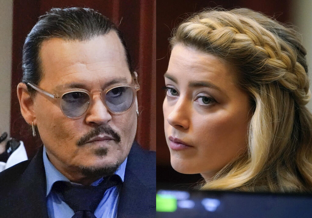 This combination of two separate photos shows actors Johnny Depp, left, and Amber Heard in the courtroom for closing arguments at the Fairfax County Circuit Courthouse in Fairfax, Va., on Friday, May 27, 2022. Heard says she doesn’t blame the jury that awarded Johnny Depp more than $10 million after a contentious six-week libel trial in her first post-verdict interview. She told Savannah Guthrie of “Today” in a clip aired Monday that she understood how the jury reached its conclusion and said Depp is a “beloved character and people feel they know him.” (AP Photos/Steve Helber, Pool)