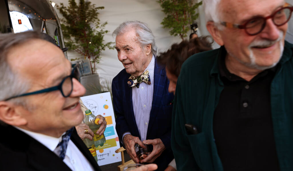 French chef Jacques Pepin, middle, arrives Thursday at the Sonoma International Film Festival in Sonoma. (Kent Porter / The Press Democrat)