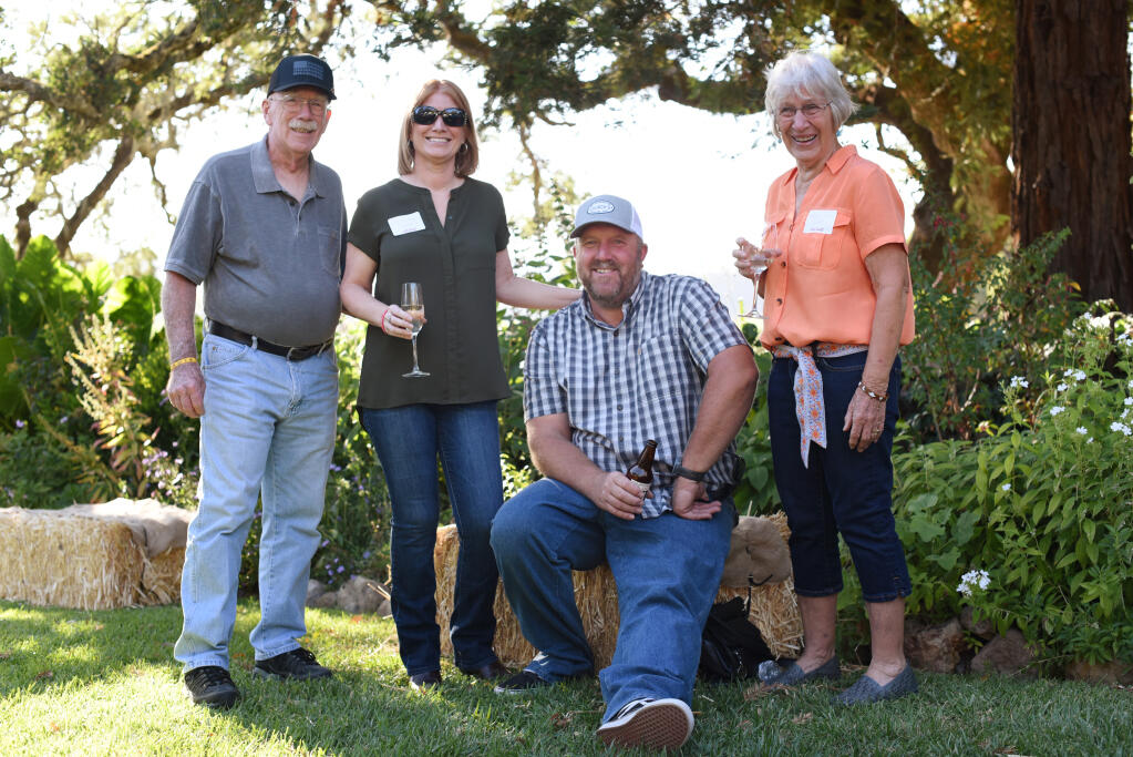 The Rolland family from left, Bruce, Jamie, C.J. and Wilma during the Boys & Girls Clubs of Sonoma Valley 9th annual Cowboy Cab benefit for teen services at Beltane Ranch in Glen Ellen, Calif., on Saturday September 11, 2021. (Photo: Erik Castro/for The Press Democrat)