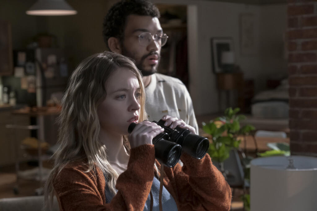 Sydney Sweeney and Justice Smith on neighborhood watch in 'The Voyeurs,' now streaming on Amazon Prime. (Bertrand Calmeau/Amazon Content Services)