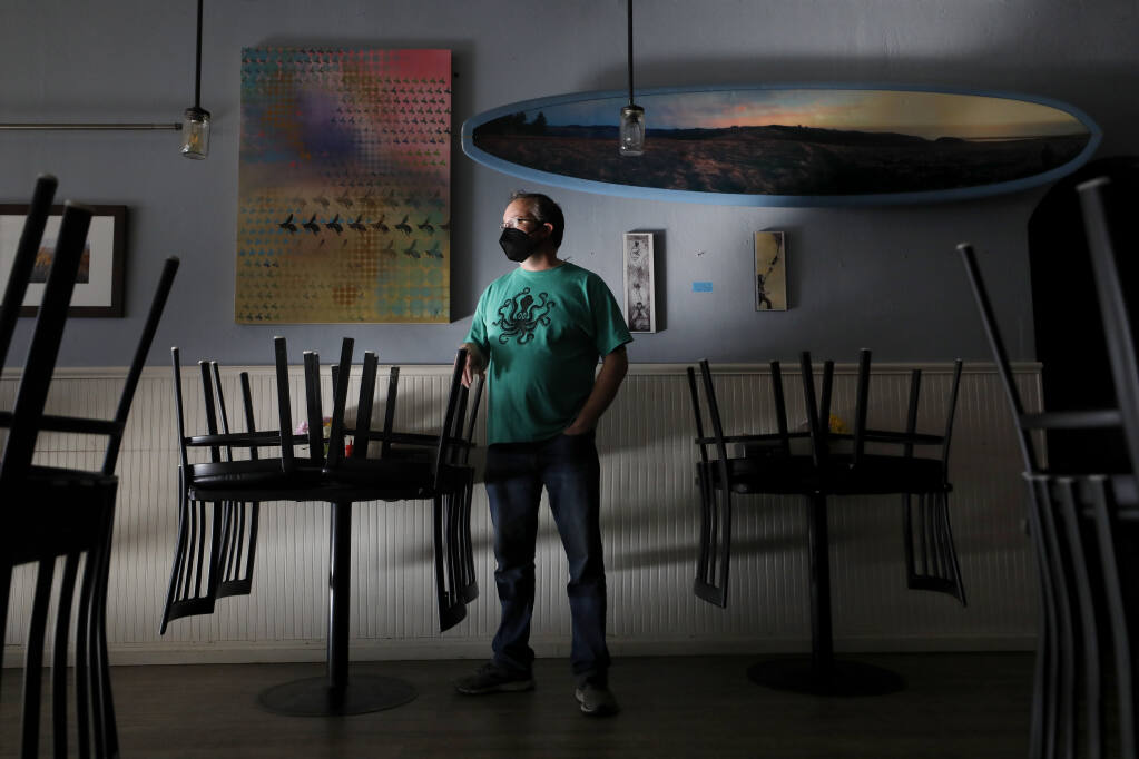 Chris Ball, owner of Down to Earth Cafe and Deli, has closed his restaurant on Mondays and Tuesdays to reduce costs as he struggles to make a profit during the COVID-19 pandemic. Photo taken at the cafe in Cotati on Tuesday, Jan. 11, 2022. (Beth Schlanker/The Press Democrat)