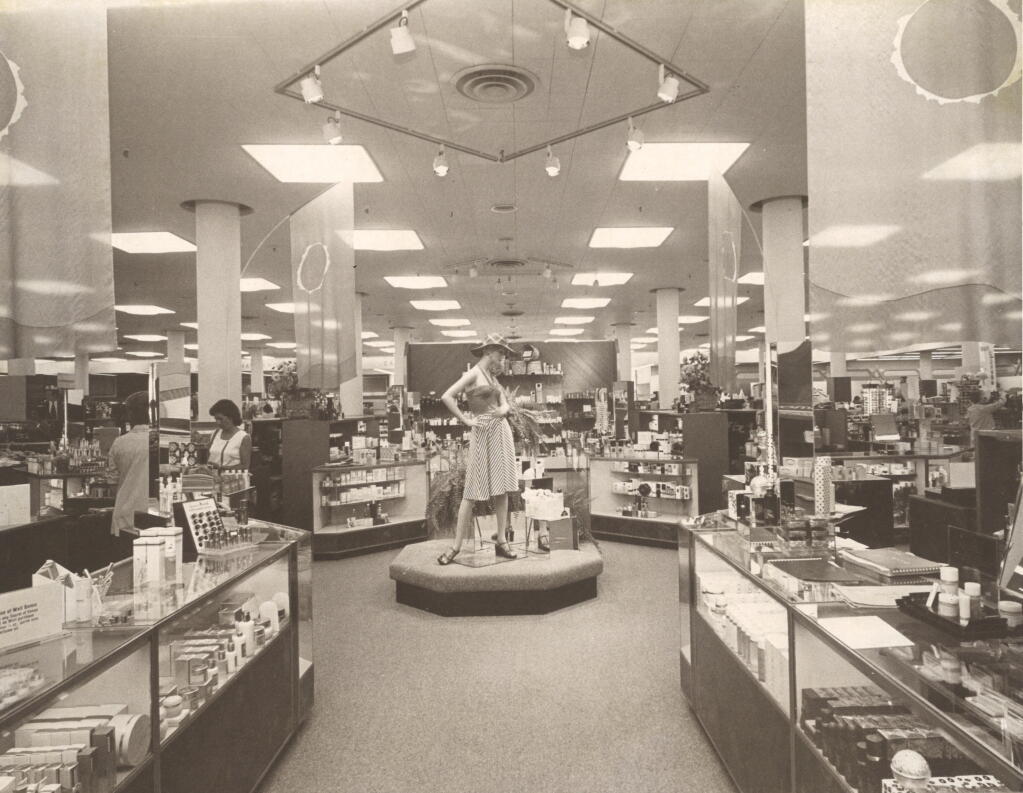 The brightly lit cosmetics counters at The Emporium department store at Coddingtown Mall in May 1975. (The Press Democrat)
