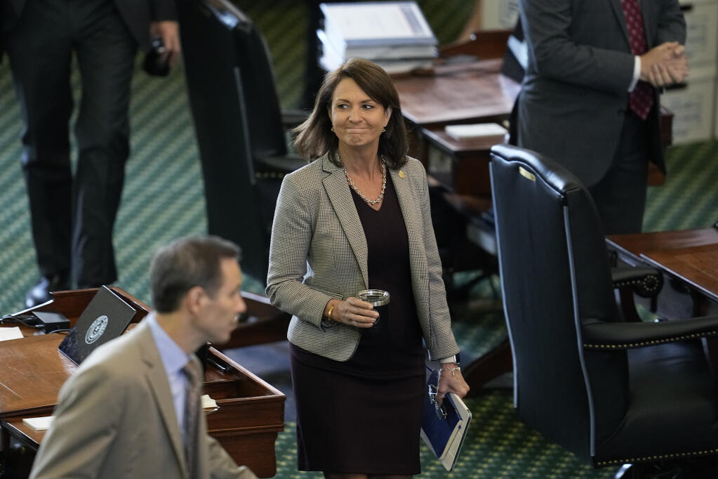 State Sen. Angela Paxton, R-McKinney, wife of suspended Texas state Attorney General Ken Paxton, arrives for her husband's impeachment trial in the Senate Chamber at the Texas Capitol, Thursday, Sept. 14, 2023, in Austin, Texas. (AP Photo/Eric Gay)
