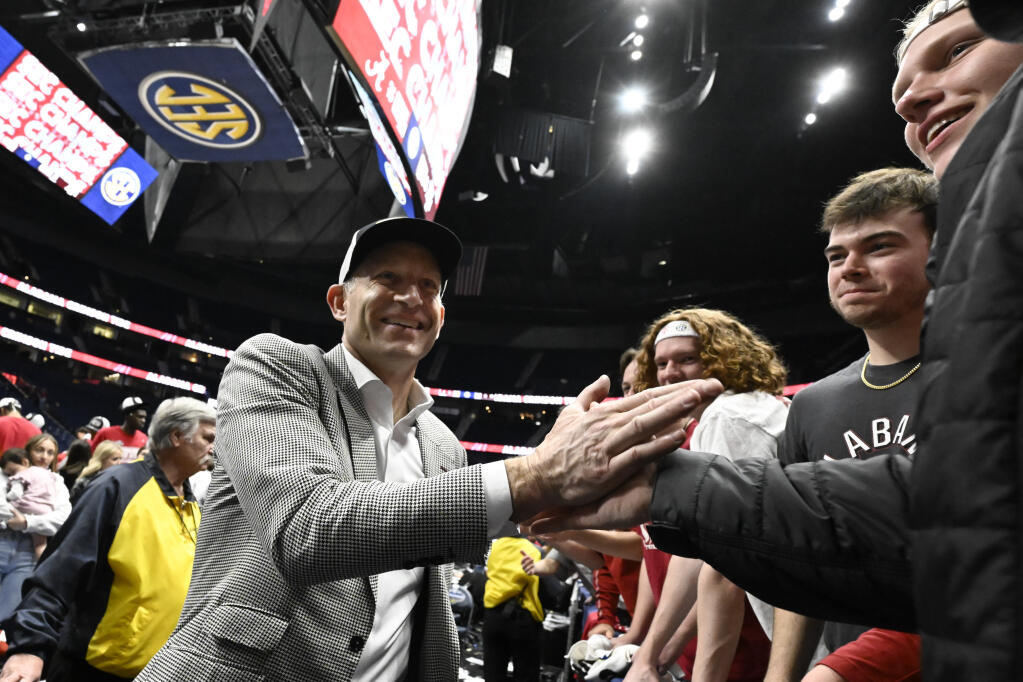 Alabama coach Nate Oats comes off the ccourt after an NCAA college basketball game against Texas A&M in the finals of the Southeastern Conference Tournament, Sunday, March 12, 2023, in Nashville, Tenn. Alabama won 82-63. (AP Photo/John Amis)