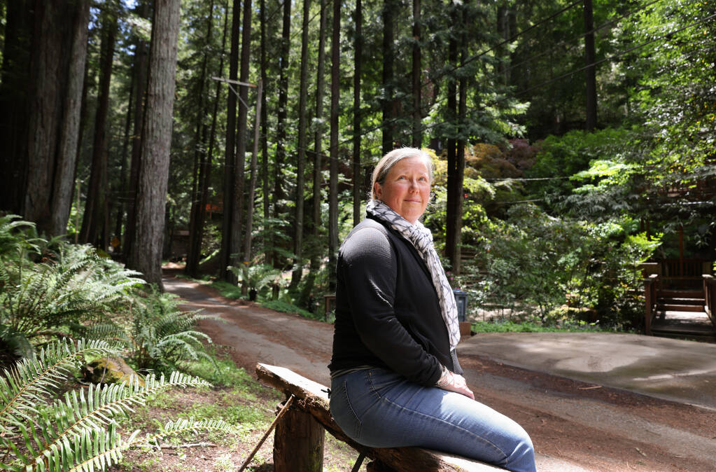 Forestville resident Claire Fetrow is concerned about the increasing number of vacation rentals in the neighborhoods along the Russian River in Forestville. Photo taken in Forestville on Monday, May 9, 2022.  (Christopher Chung/ The Press Democrat)