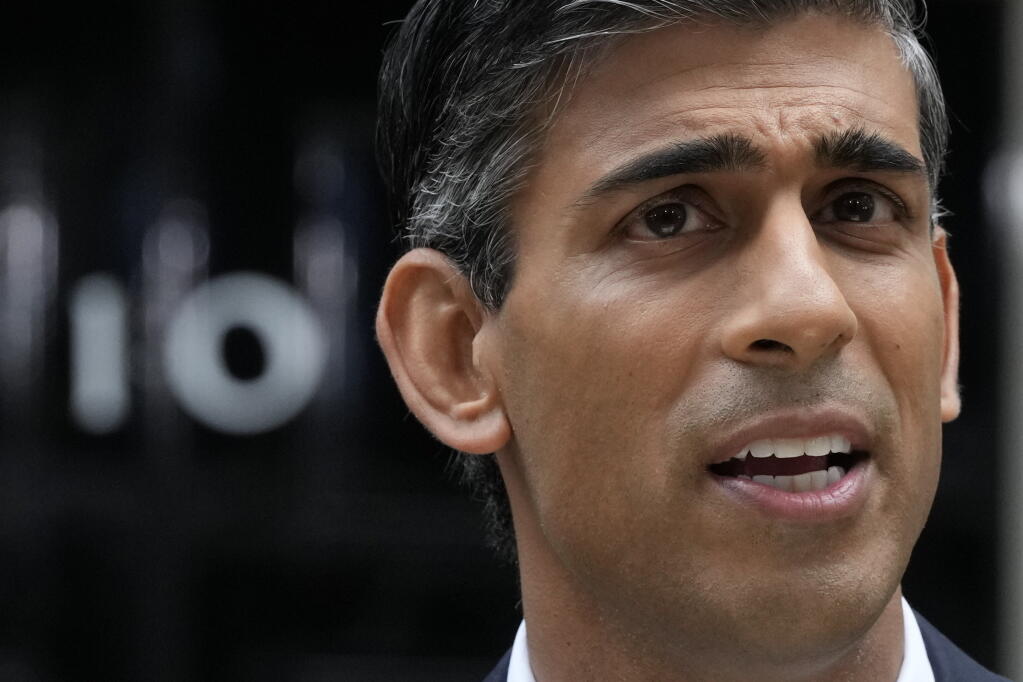 New British Prime Minister Rishi Sunak speaks at Downing Street in London, Tuesday, Oct. 25, 2022, after returning from Buckingham Palace where he was formally appointed to the post by Britain's King Charles III. (AP Photo/Frank Augstein)