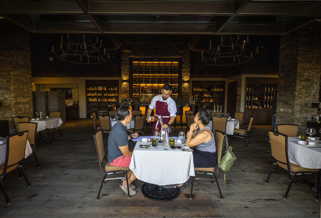 On Sept. 23, Blue Note Napa is hosting Napa/NOLA: A Day of New Orleans Music and Food at the Meritage Resort and Spa. Above, the dining room at the Village Bistro at the Meritage Resort and Spa in Napa, Sept. 16, 2022. (John Burgess / The Press Democrat)